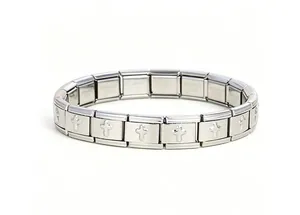 Detailed macro view of a stainless steel Italian charm bracelet with cross pattern links