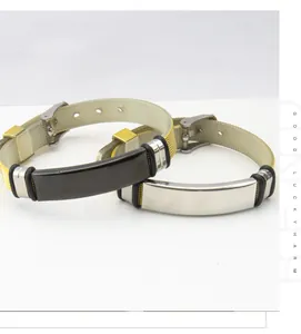 Close-up of stainless steel ID bracelets with adjustable watch strap design for couples.