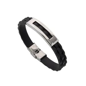 Punk style men's black silicone bracelet with stainless steel plate on a white background