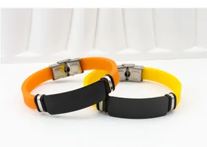 Detailed view of two minimalist silicone ID bracelets with blank stainless steel plates
