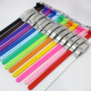 Collection of colorful adjustable silicone bracelets with blank stainless steel plates for engraving