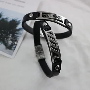 Stylish black leather couples bracelet set with engraved Greek key patterns in titanium steel