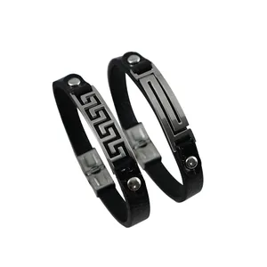 Pair of black leather bracelets with stainless steel Greek key and geometric designs