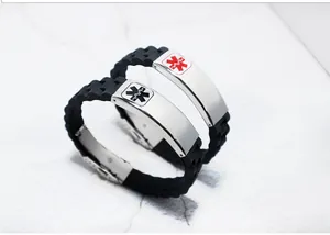 Detailed close-up of stainless steel medical ID bracelets with durable black silicone bands