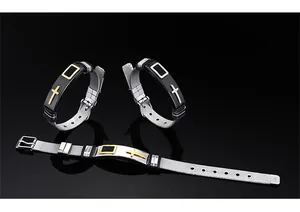 Detailed view of adjustable stainless steel mesh bracelets with religious cross motifs