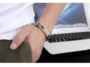 Men's religious cross stainless steel bracelet detail view shown worn on a wrist