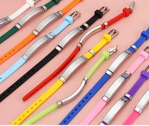 Detailed view of colorful adjustable silicone bracelets with metal ID tags for children
