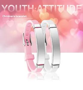 Detail of children's adjustable silicone bracelet with polished metal plate