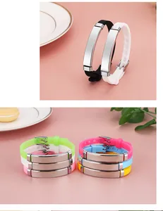 Multiple colorful adjustable silicone bracelets with blank metal plates for engraving