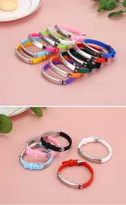 Multi-color adjustable kids silicone bracelets with stainless steel id plates for children.