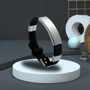 Minimalist black silicone bracelet featuring an engravable curved stainless steel plate