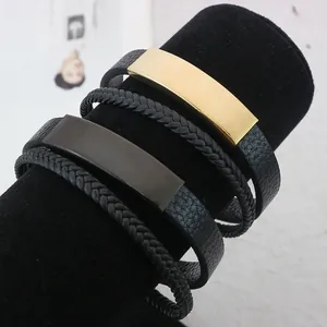 Minimalist stainless steel men's bracelet with braided leather rope and engravable plate