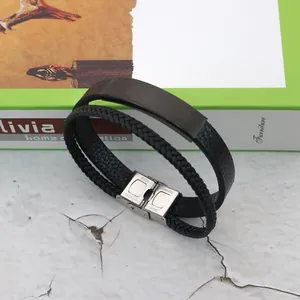Multi-strand black braided leather bracelet with engravable stainless steel plate for men.
