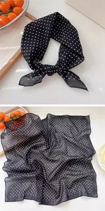 Black polka dot silk-like square scarf shown in both tied bow and unfolded detail views.