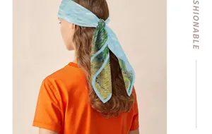 Detailed view of the Van Gogh oil painting series silk scarf worn as a stylish headband.