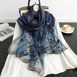 Premium navy blue silk wool scarf featuring intricate floral embroidery and beadwork