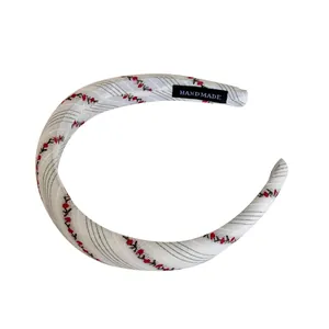 Sweet white striped fabric headband with red cherry embroidery and handmade label