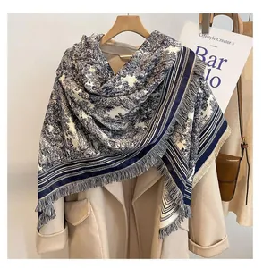 Detail shot of blue and white Toile de Jouy pattern large square shawl with fringe