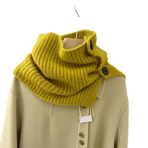 Retro yellow knitted neck warmer with decorative buttons for autumn and winter warmth.