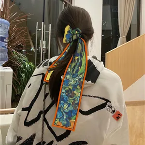 Van Gogh starry night oil painting skinny silk scarf tied as a stylish hair ribbon