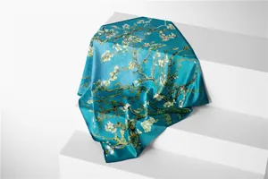 Close-up detail of luxury silk scarf featuring Van Gogh Almond Blossoms art design