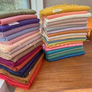 Soft winter solid color pashmina scarves with decorative tassels in various colors