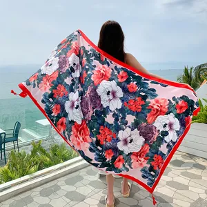 Large pink floral print beach shawl with red tassels for sun protection