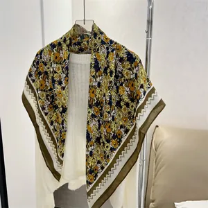 Detailed macro view of the vintage floral pattern on this cotton linen 90cm square scarf