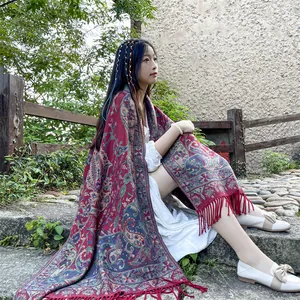Bohemian ethnic style thick shawl with red paisley patterns and fringe details for travel