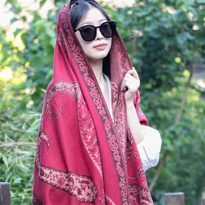 Elegant red paisley ethnic shawl, thick winter pashmina scarf for travel photography.