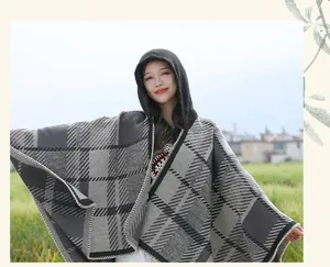 Elegant vintage plaid hooded poncho shawl coat for women on model in outdoor setting