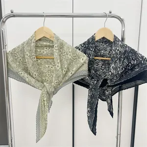 Detailed view of 90cm cotton linen pleated square scarves with elegant paisley print
