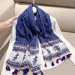 Ethnic style blue and white floral scarf with red and blue tassels for women