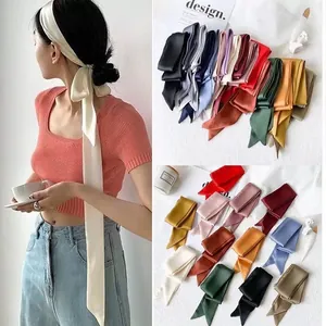 Versatile 200cm long solid color silk-like ribbon scarf used as a hair headband and bag tie.