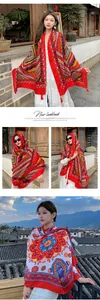 Vibrant ethnic style oversized shawl with intricate patterns and red tassel details