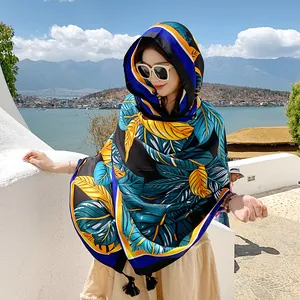 Bohemian floral leaf print shawl for travel and sun protection in blue and yellow