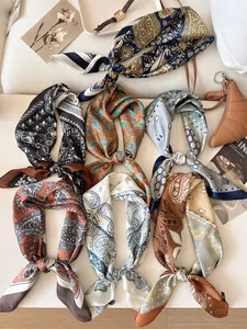 Collection of vintage paisley silk scarves for women in various colors and elegant patterns