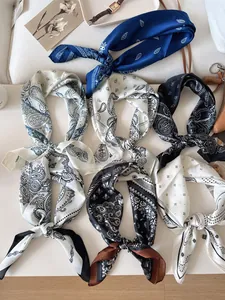 Collection of elegant vintage paisley silk scarves and square neckerchiefs in various colors