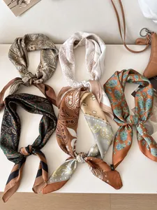 Elegant collection of vintage paisley silk scarves for women in earthy color tones