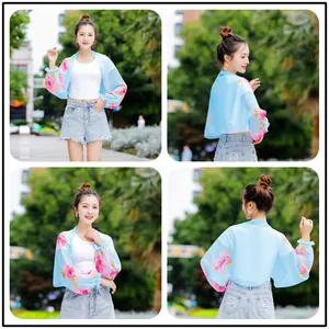 Comprehensive four-way views of a light blue floral chiffon sun protection shrug for summer