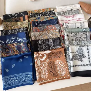 Collection of vintage paisley silk square scarves for women in assorted colors and patterns