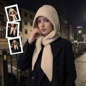 Premium beige knitted balaclava hooded scarf for women in a cozy autumn street setting