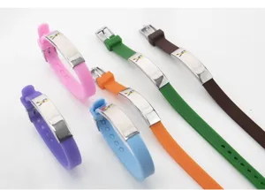 Detail view of colorful silicone autism awareness bracelets with stainless steel plates