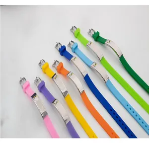 Collection of colorful silicone medical alert wristbands with stainless steel plates