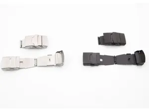 Detailed macro view of 18mm stainless steel watch clasps in silver and black matte finish