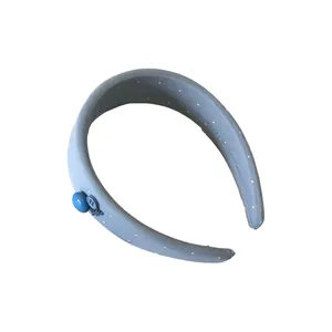Blaues gepolstertes Stirnband mit weißen Punkten, Knöpfen und Handarbeit-Anhänger Design