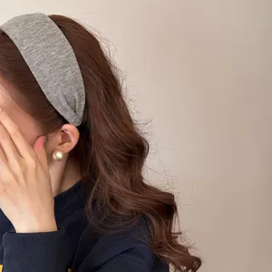 Elegant gray thick ribbed headband for women with a high top French style design