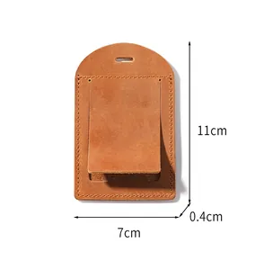 Detailed view of a brown crazy horse leather luggage tag featuring a hidden card slot