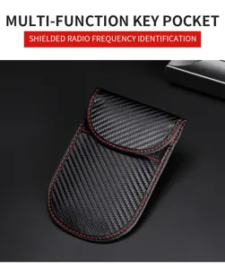 Detail of RFID blocking car key pouch with carbon fiber texture and red stitching.