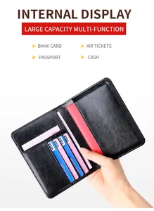 Macro view showing internal card slots and passport compartment of the leather travel holder.